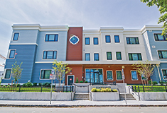 NEI General Contracting reconstructs 16 units destroyed by fire for Just-A-Start