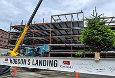 Consigli Construction and Reger Dasco top off Hobson’s Landing mixed-use project