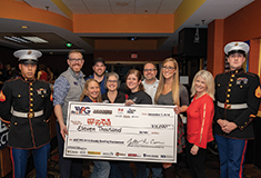 ABC NH/VT Young Professionals Group donates proceeds from charity bowling tournament to Toys for Tots