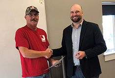 Jewett Construction presents Safety Awards to Bernier and Holcomb