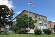 Stoll and Aron of Metrowest broker $2.6m sale of Marian High School