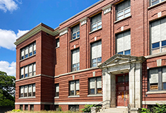 The Goldman Group hires David Sisson Arch. to redesign former Woonsocket middle school into  apartments