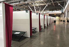 Construction workers convert Boston Convention & Exhibition Center into COVID-19 field hospital