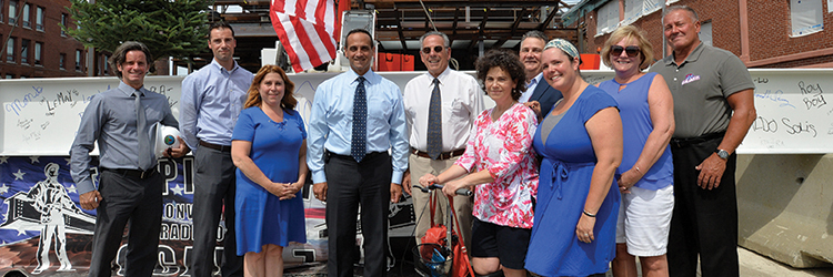 Suffolk hosts topping-off ceremony at Somerville High School: $256 million renovation and construction project