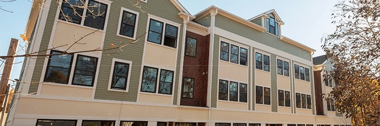 Denenberg Realty Advisors sells 12-unit mixed-use apartment building at 57-59 Pleasant St. for $2.8 million