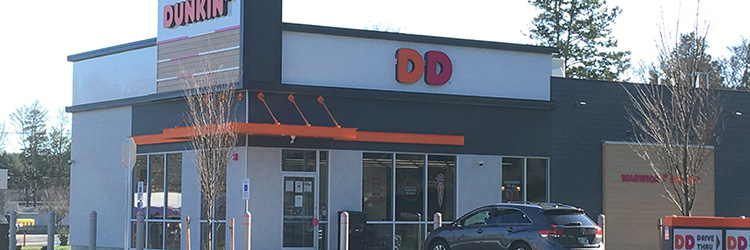 Greenman of Capstone Properties brokers $600,000 acquisition of land at 341 Providence St. for a new Dunkin