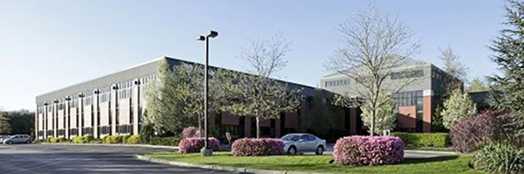 Sweeney Real Estate represents buyer of 71,130 s/f office building for $4.8 million - for 695 George Washington Highway, Lincoln, RI