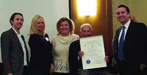 Harold Brown presentation shown (from left) are: Jameson Brown, Maura Nolan Brown, Andrea Howard, Harold Brown and Andrew Musto.