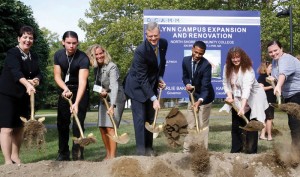 Shown are: NSCC president Patricia Gentile (left), governor Charlie Baker (center), student government association president Nathaniel Montero (right of governor) and NSCC community representatives.