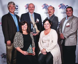 Shown is the PROCON project team accepting the 2015 ABC Excellence in Construction awards