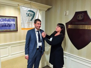 Shown (from left) are: Rob Scinto and chapter treasurer Kristin Geenty