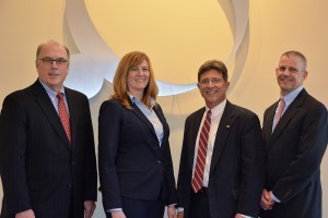 Shown (from left) are: M. Dale Janes, regional president; Marie Thresher, executive VP and COO; Jeff Sattler, managing director and Geoffrey  Hesslink, president and CEO.