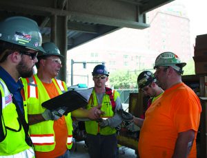 Daily task planning and open communication are key to Cannistraro’s safety program.  Field leadership is seen here going over the pre-task plan, logistics and potential safety hazards before rigging a modular assembly into place.