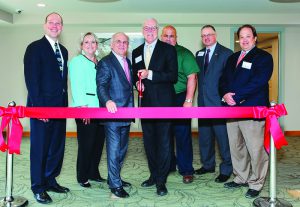 hown (from left) are: Paul Joseph, president, MetroWest Chamber of Commerce; Jill Schindler, director of marketing and operations, MetroWest Chamber of Commerce; Ed Zuker, founder/CEO, Chestnut Hill Realty; Bob Halpin, town manager, Framingham; Mike Tusino, director/building commissioner, Framingham; Art Robert, director of community and economic development, Framingham; Chris Rodgers, director of real estate planning and design, Chestnut Hill Realty.