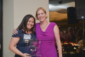Susan Shelby (right) of Rhino Public Relations receives the SMPS Boston Chapter 2016 Marketing Professional of the Year Award