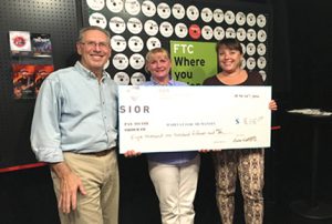 Eileen Bakos, Habitat of Coastal Fairfield County (center) accepting a check from Bruce Wettenstein, SIOR and Kristin Geenty, SIOR