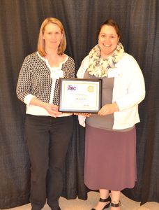 Shown from left are project manager Evelyn Wendell and marketing manager Laura Burch accepting JM  Coull’s Sixth Diamond STEP Award