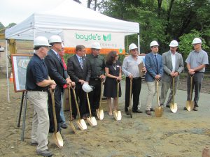 Shown (from left) are: Robert Bullock, Jr., building commissioner; state representative Shawn Dooley; Scott Bugbee, selectman; state senator Richard Ross; Scott LaMontagne, project manager; Danielle Rochefort, BHHS Page Realty; Bisher Hashem, general manager, Stonebridge Homes; Eoghan Kelley, general manager, Stonebridge Homes; Jack Hathaway, town administrator and Ray Goff, town planner.