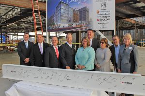Shown (fron left) are: Donald Birch, Leggat McCall; Tony Economou, Worcester City Councilor District One; Tim Murray, Worcester Reg. Chamber of Commerce; Mark Stebbins, PROCON and XSS Hotels; Ann Tripp, Opus Investments; Edward Augustus, Jr., city manager; Candy Mero-Carlson, City Councilor District Two; Leo Xarras, XSS Hotels; and Christine Thomas, XSS Hotels.