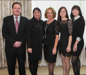 Shown (from left) are: John Shea, Dawn Guiney, Lisa Oâ€™Neill, Andrea Catino, and Cherie Poirier - all agents with very strong South Shore community ties. 