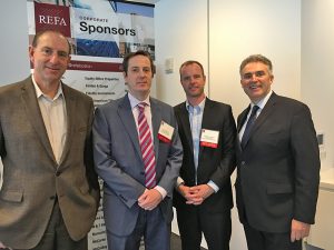 Shown (from left) are: Ted Tye of National Development; Jim Fitzgerald of the Boston Planning & Development Agency; Charley Leatherbee of Skanska; and Jim Rooney of the Greater Boston Chamber of Commerce at the October 25 event.