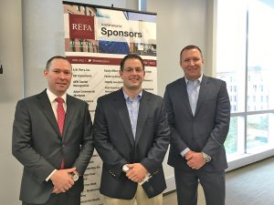 Shown (from left) are: Justin Frenzel of PwC; David Swerling of PwC; and Brian Connolly of JLL at the October 27 event.