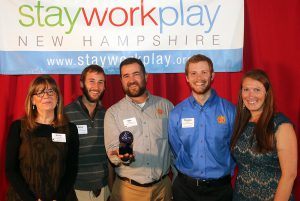 Shown (from left) are: Betsy Gardella, president and CEO, NH Public Radio; Dylan Lucas, Daniel Clapp and Thomas Hobbs of ReVision Energy; and Kate Luczko, president and CEO, Stay Work Play NH.