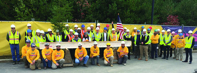 JLL Construction holds topping-off for EMD Serono expansion project